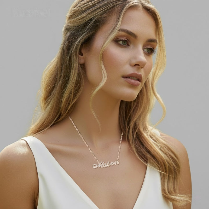 Female model layering the custom crystal name necklace.