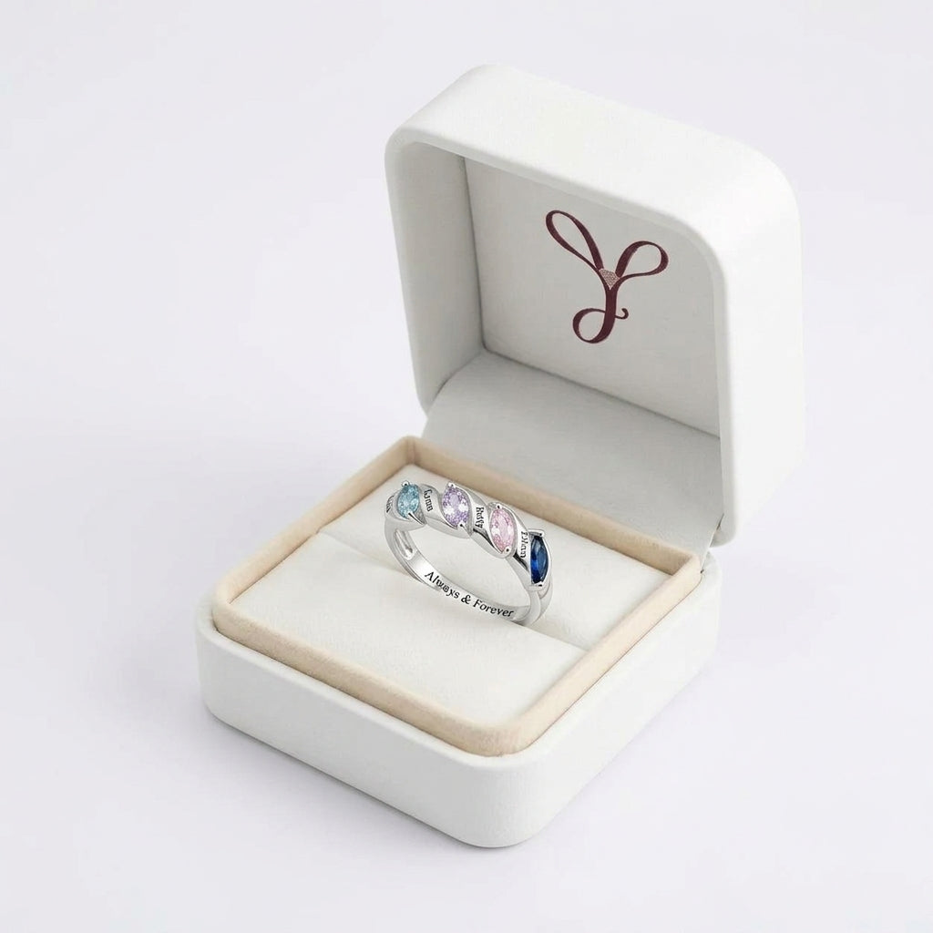 Custom four birthstone family name band ring gift box view