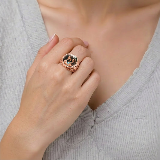 Custom round photo filigree signet ring worn on hand