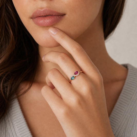 Custom two marquise birthstone vine ring worn on hand