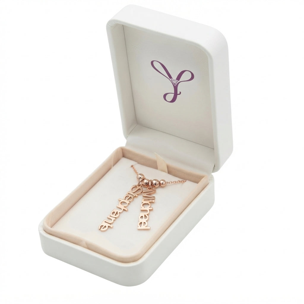 Custom two name charm necklace displayed in a gift box