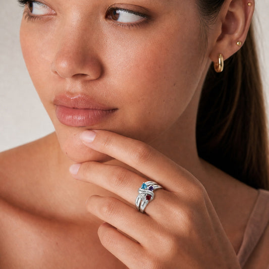 Custom family ribbon birthstone ring on hand jewelry view