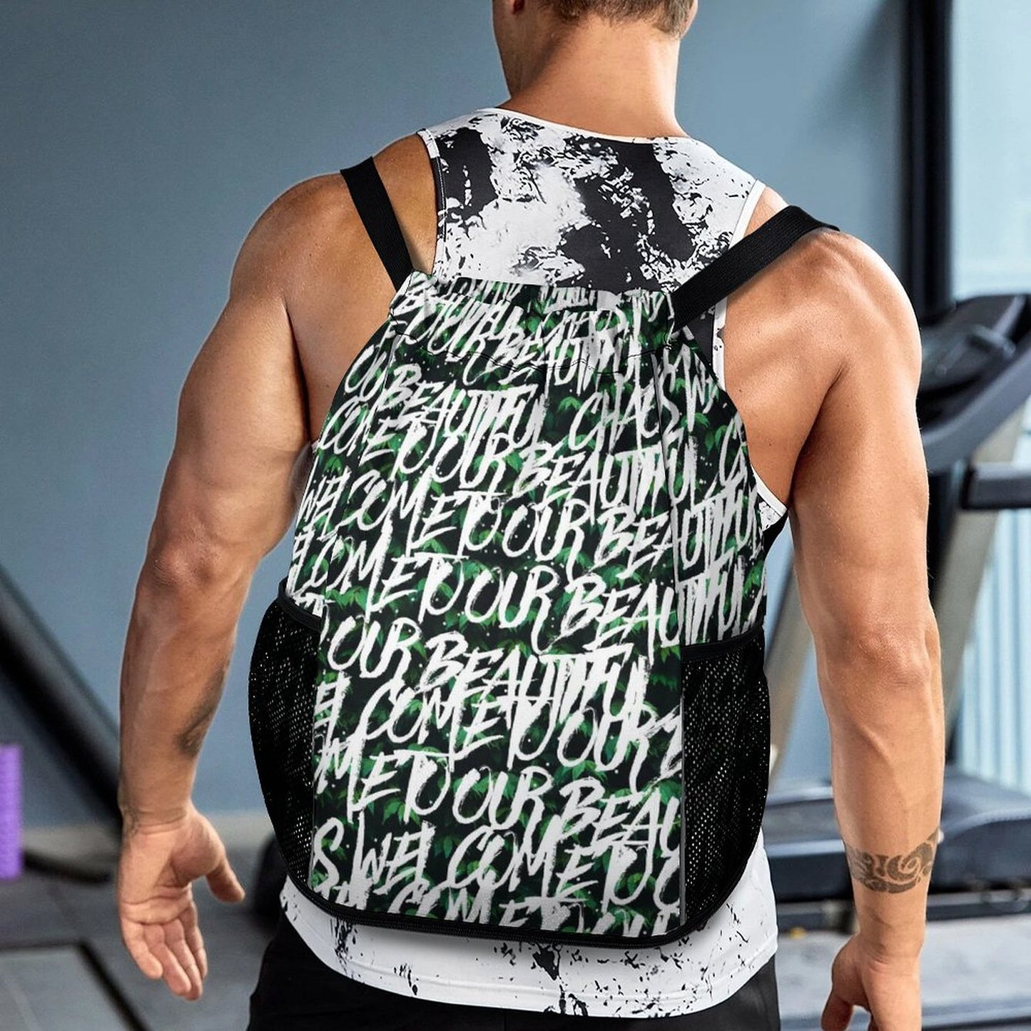 Gym Drawstring Bag with personalized graphic worn by man inside a fitness center.