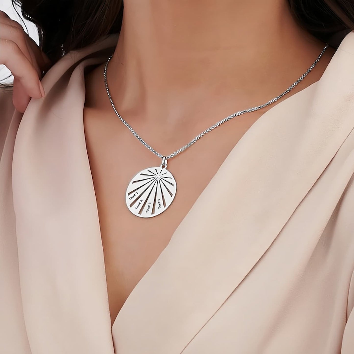 Model wearing the personalized sterling silver family round necklace, showing the size and fit on the neckline.