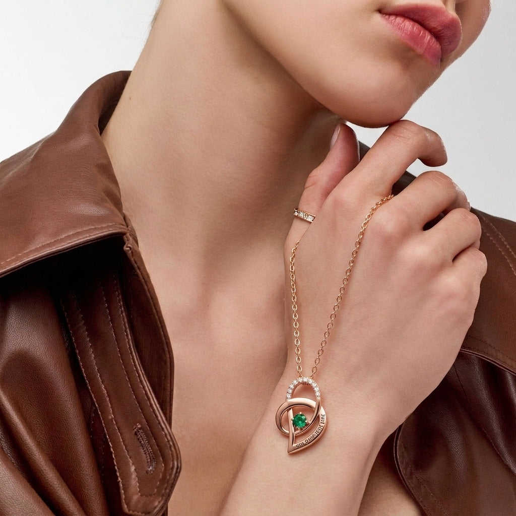 Custom Engraved Rose Gold Infinity Heart Birthstone Necklace Close-up Shot