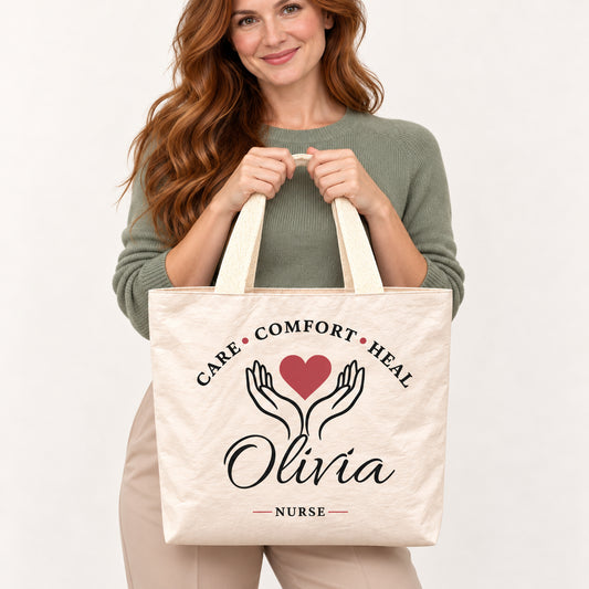 Cream Care Comfort Heal tote personalized with Olivia, shown close up with the custom name and printed artwork visible.