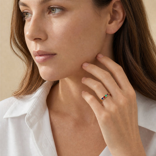 Personalized family birthstone ring shown in everyday wear
