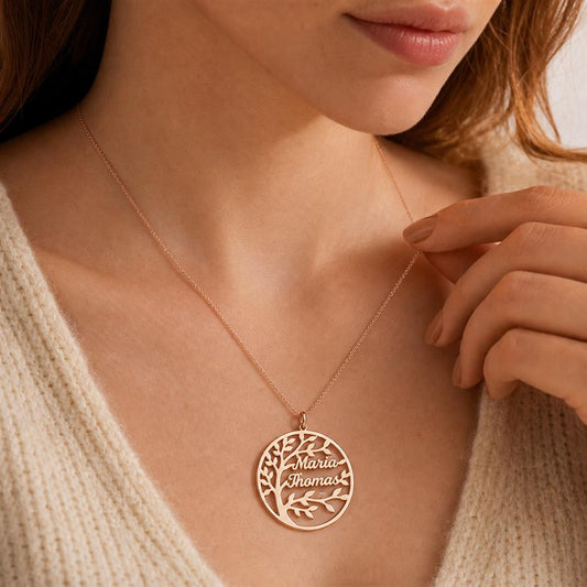 Woman wearing a family tree name necklace