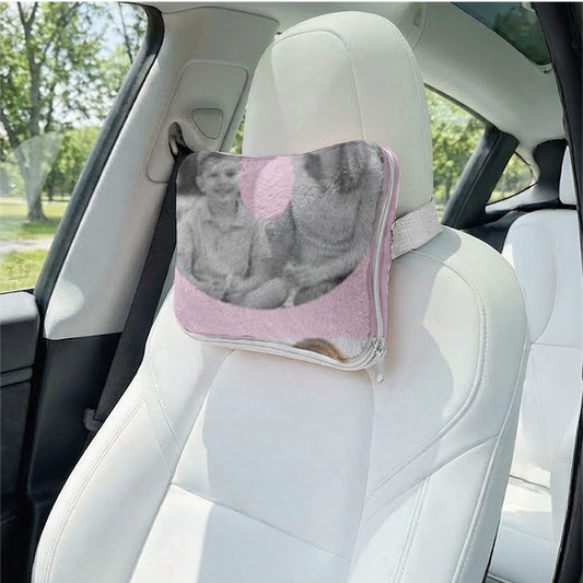 Blanket used as a travel car pillow