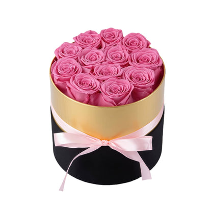 Design luxury 12 pink preserved roses in a black and gold box. Long lasting romantic gift.