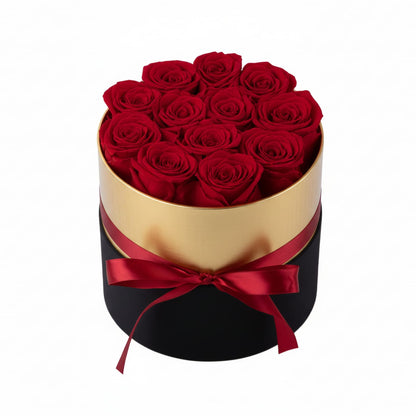 Design luxury 12 red preserved roses in a black and gold box. Long lasting romantic gift.