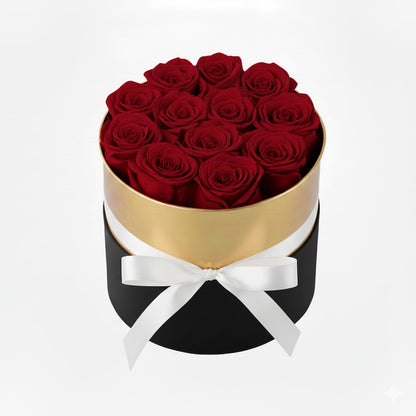 Design luxury 7 wine red preserved roses in a black and gold box. Long lasting romantic gift.