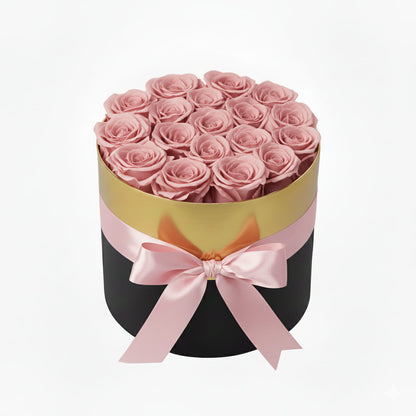 Design luxury 18 pink preserved roses in a black and gold box. Long lasting romantic gift.