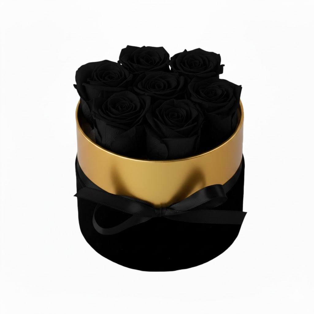 Design luxury 7 black preserved roses in a black and gold box. Long lasting romantic gift.