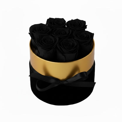 Design luxury 7 black preserved roses in a black and gold box. Long lasting romantic gift.