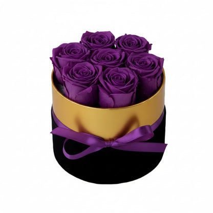 Design luxury 7 purple preserved roses in a black and gold box. Long lasting romantic gift.