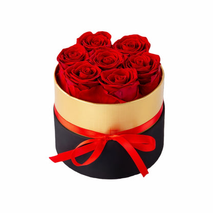 Design luxury red preserved roses in a black and gold box. Long lasting romantic gift.