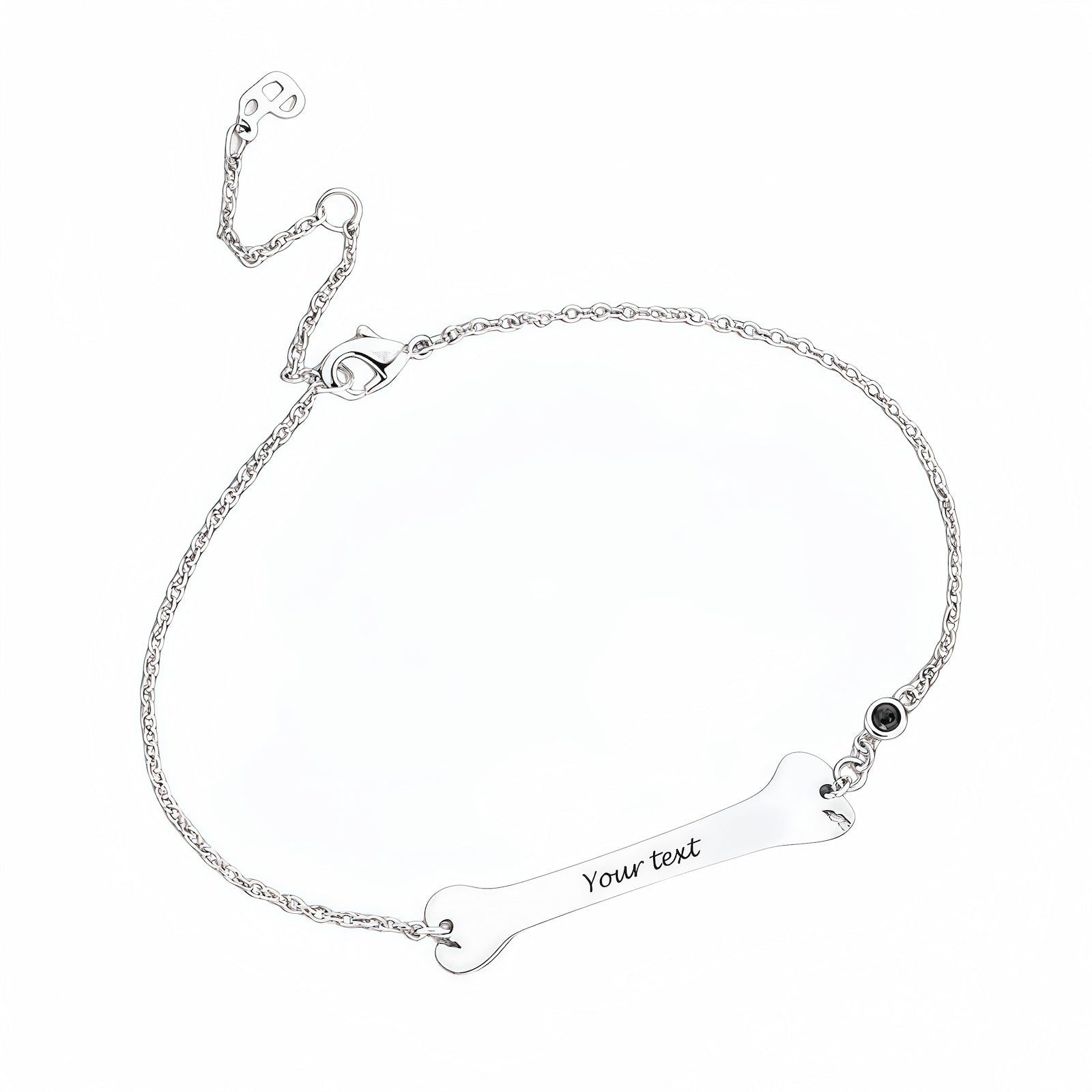 925 Sterling Silver personalized bone bracelet, flat lay product shot.