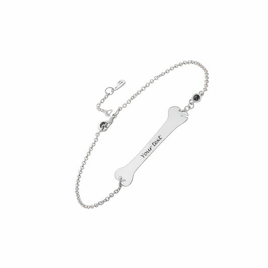 925 Sterling Silver personalized dog bone bracelet for pet lovers, with engraving.