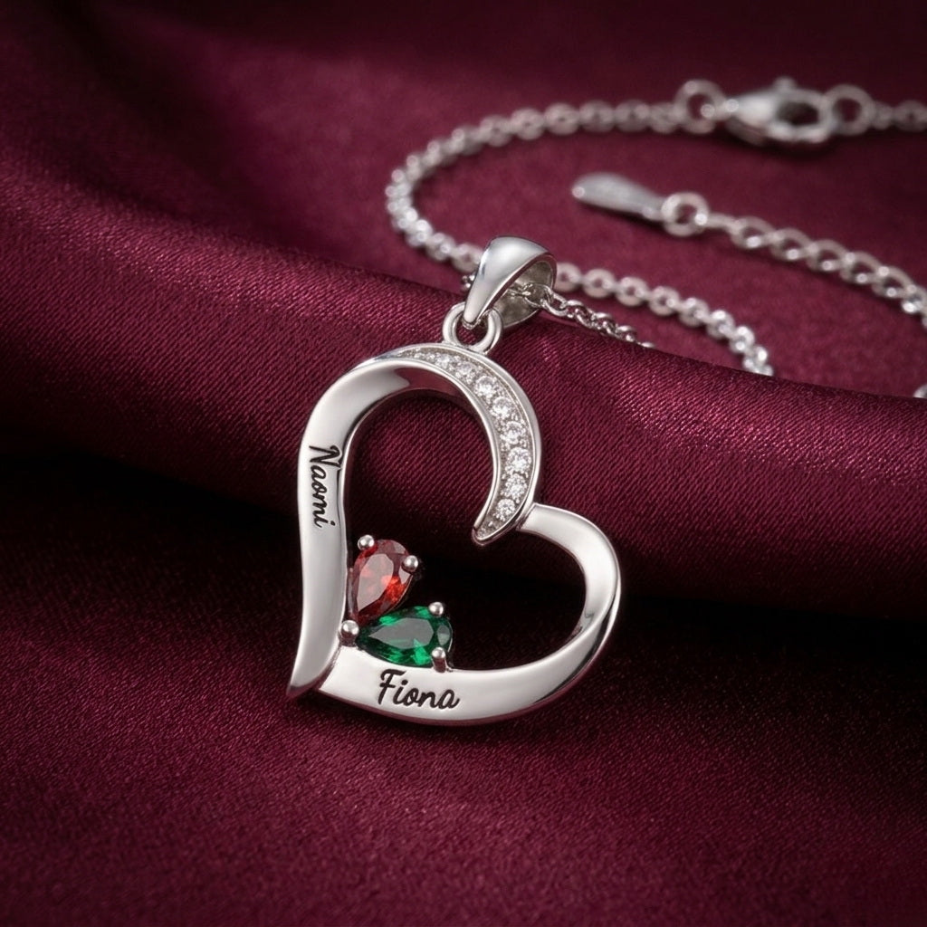 Silver engraved heart necklace on burgundy silk