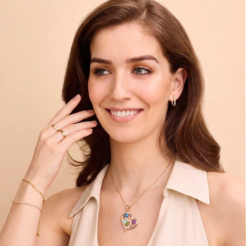 Model wearing silver custom family heart necklace.