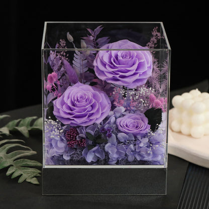 Beautiful birthday or Mother's Day gift: A purple preserved floral arrangement in a transparent, dust-proof case.