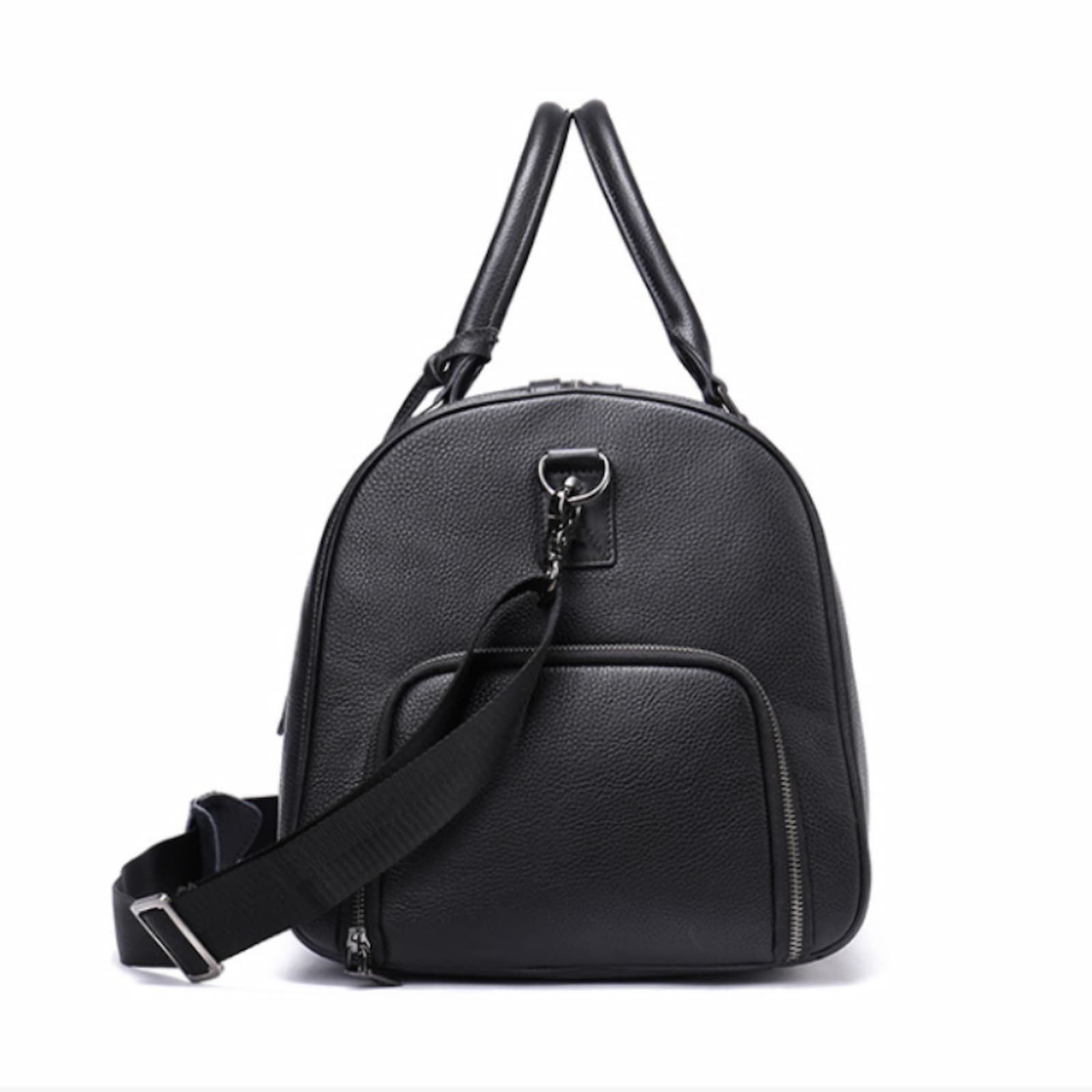 Side view of the personalized black leather travel bag 