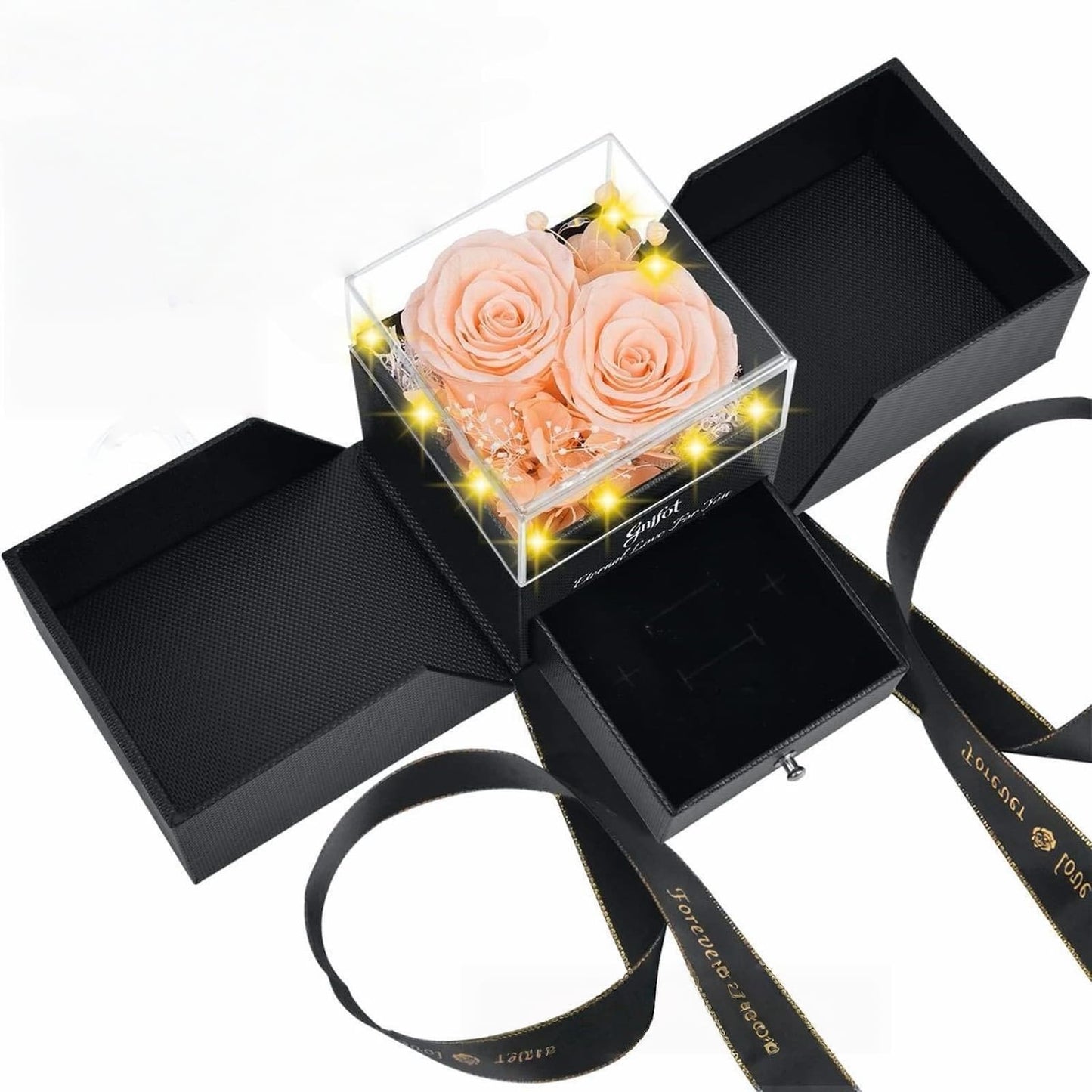 Soft champagne peach preserved roses in a romantic LED-lit jewelry gift box.