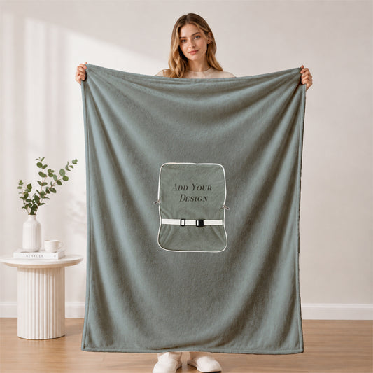 Woman showcasing a large custom-branded corporate blanket.