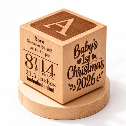 Custom wood baby keepsake cube engraved with birth date, time, weight, height, and Baby's First Christmas message
