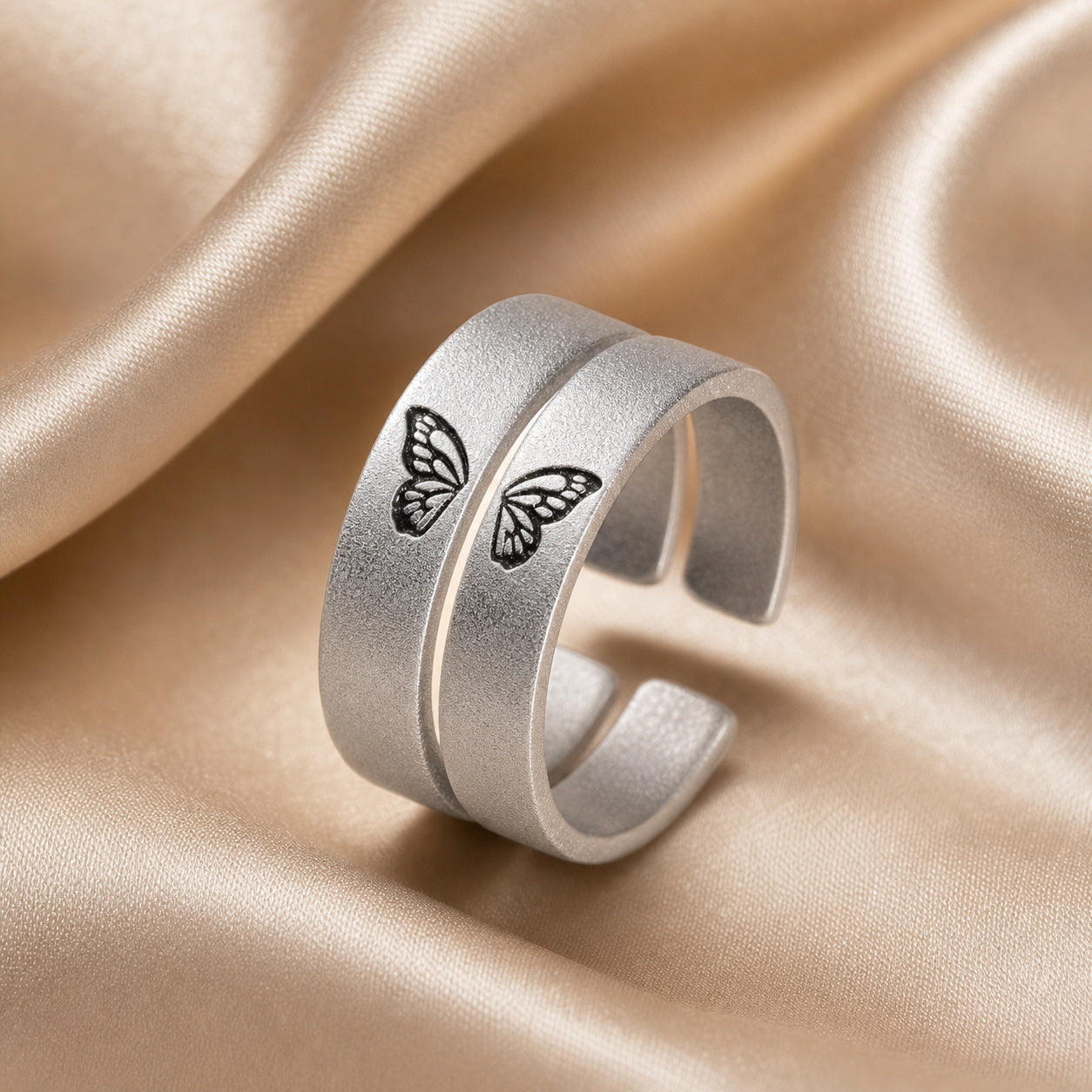 Custom butterfly open band ring detail view