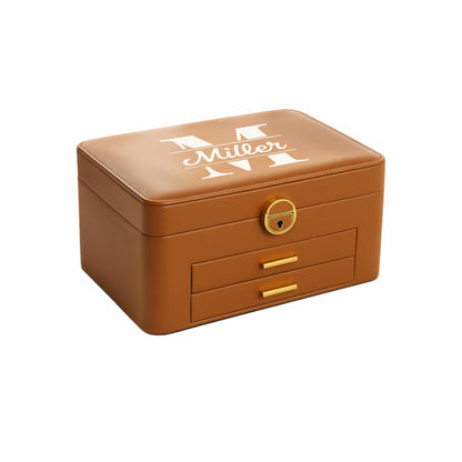 Elegant custom-engraved, two-drawer jewelry storage case with gold hardware and lock.