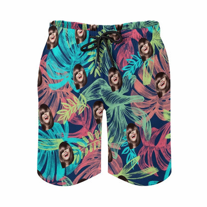 Custom face men's Hawaiian swim trunks, tropical floral design.