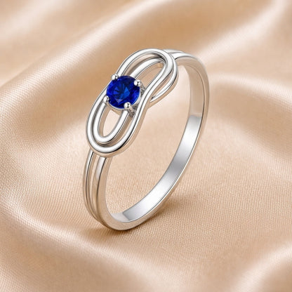 Custom geometric birthstone ring detail view