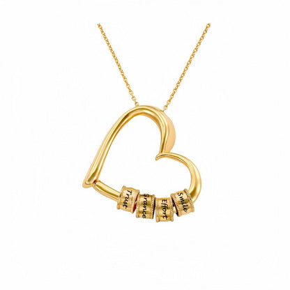 Gold plated personalized heart necklace with four engraved name beads, perfect custom jewelry gift for her.