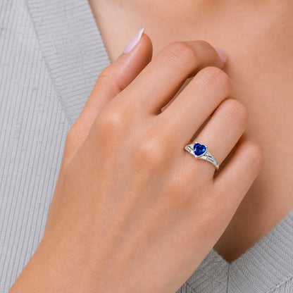 Custom heart birthstone name ring on hand