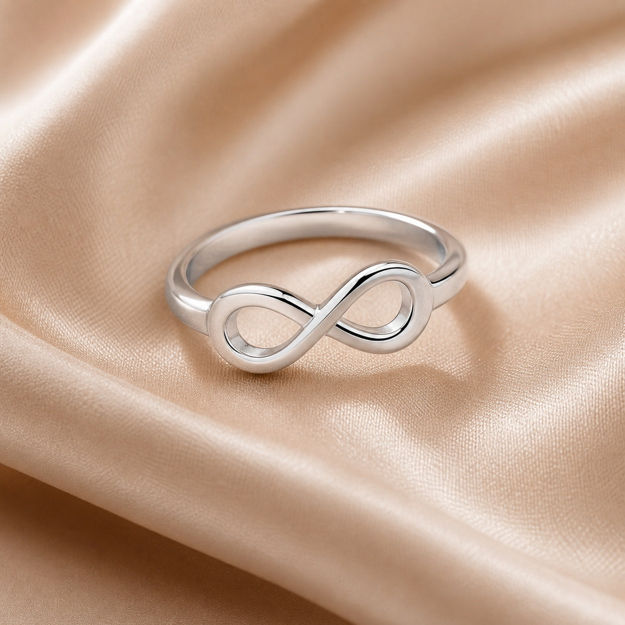 Custom infinity engraved name ring detail view