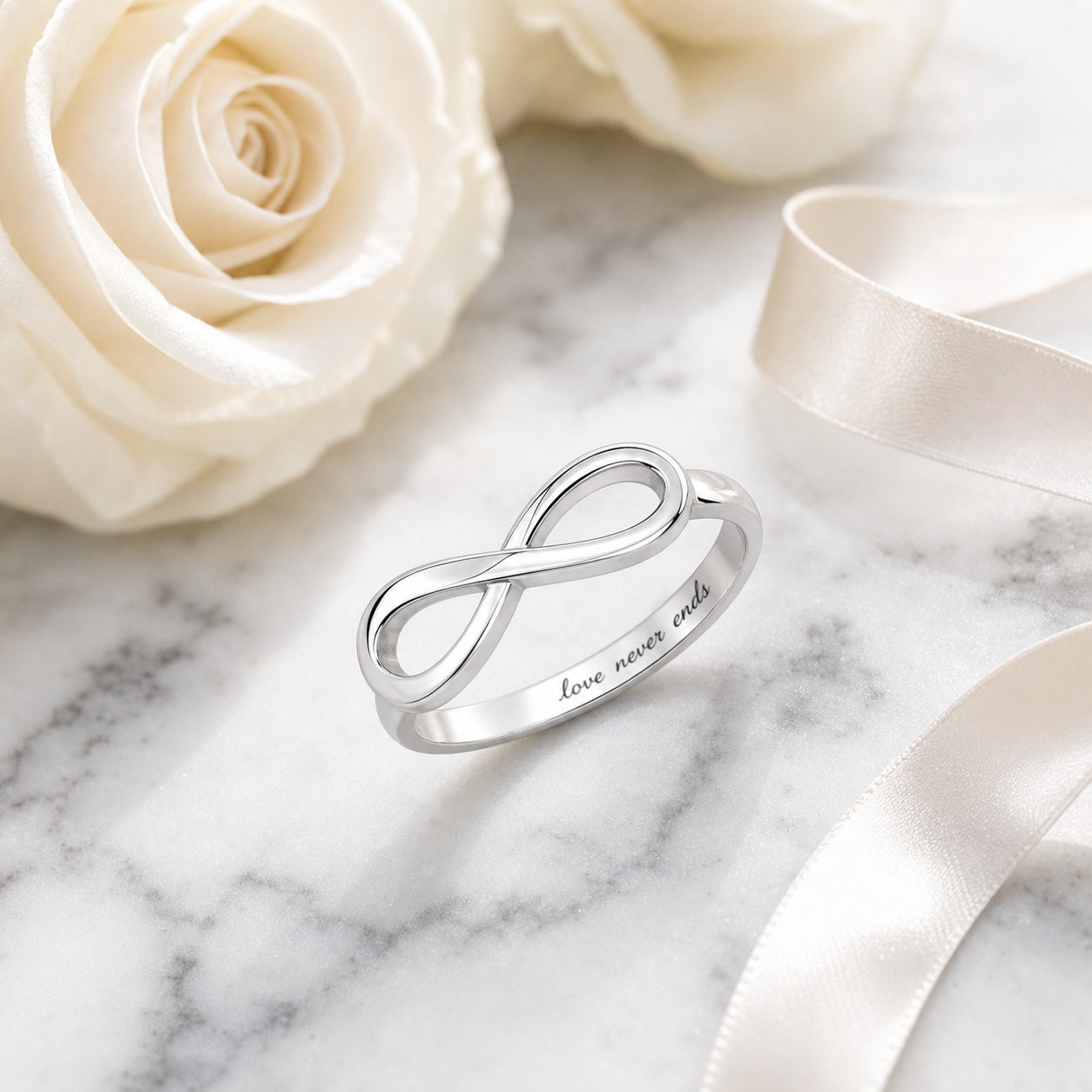 Custom infinity engraved name ring side view