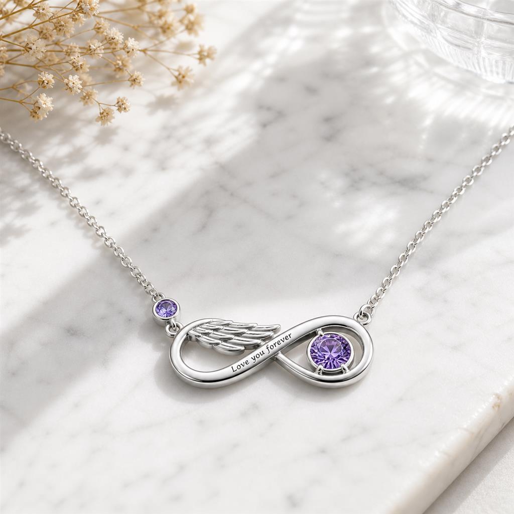 Infinity birthstone necklace on marble