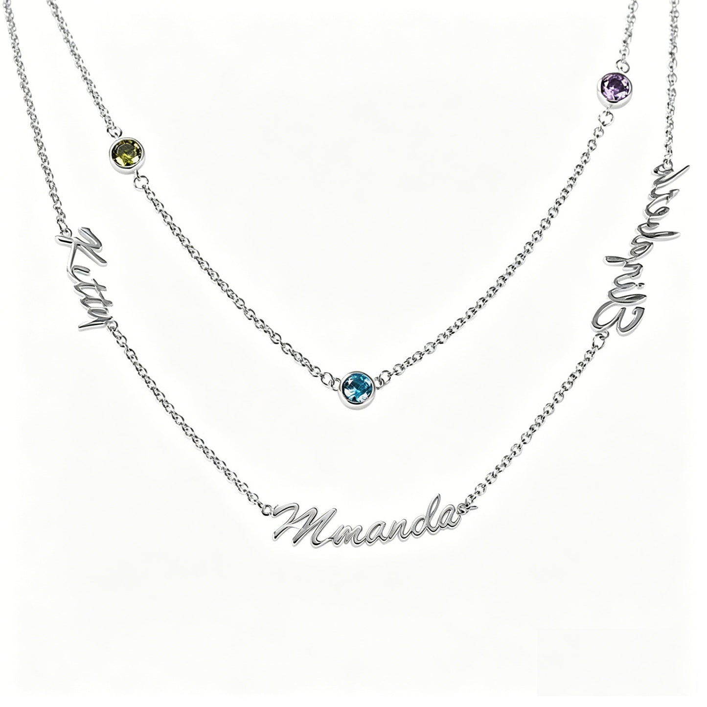 Layered family name necklace on marble