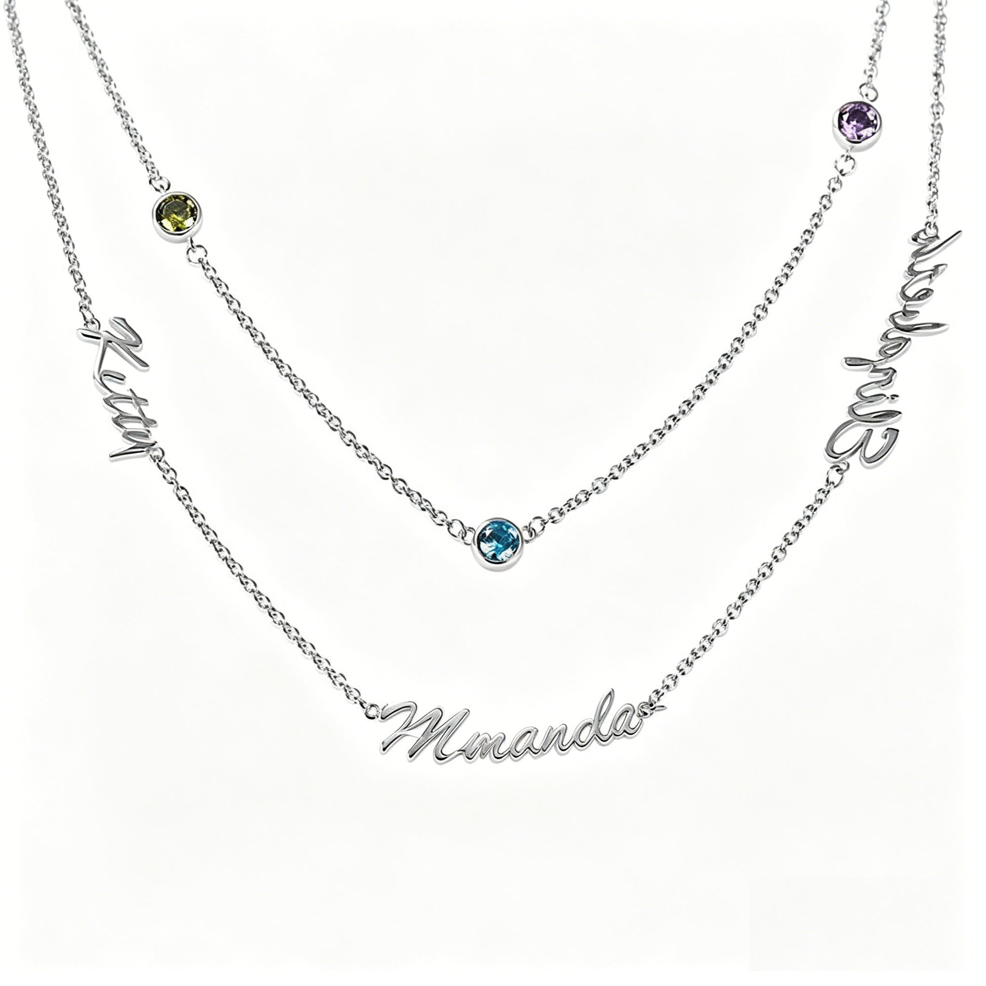 Layered family name necklace on marble