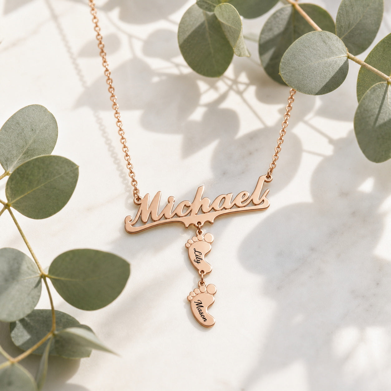 Name baby feet necklace with eucalyptus