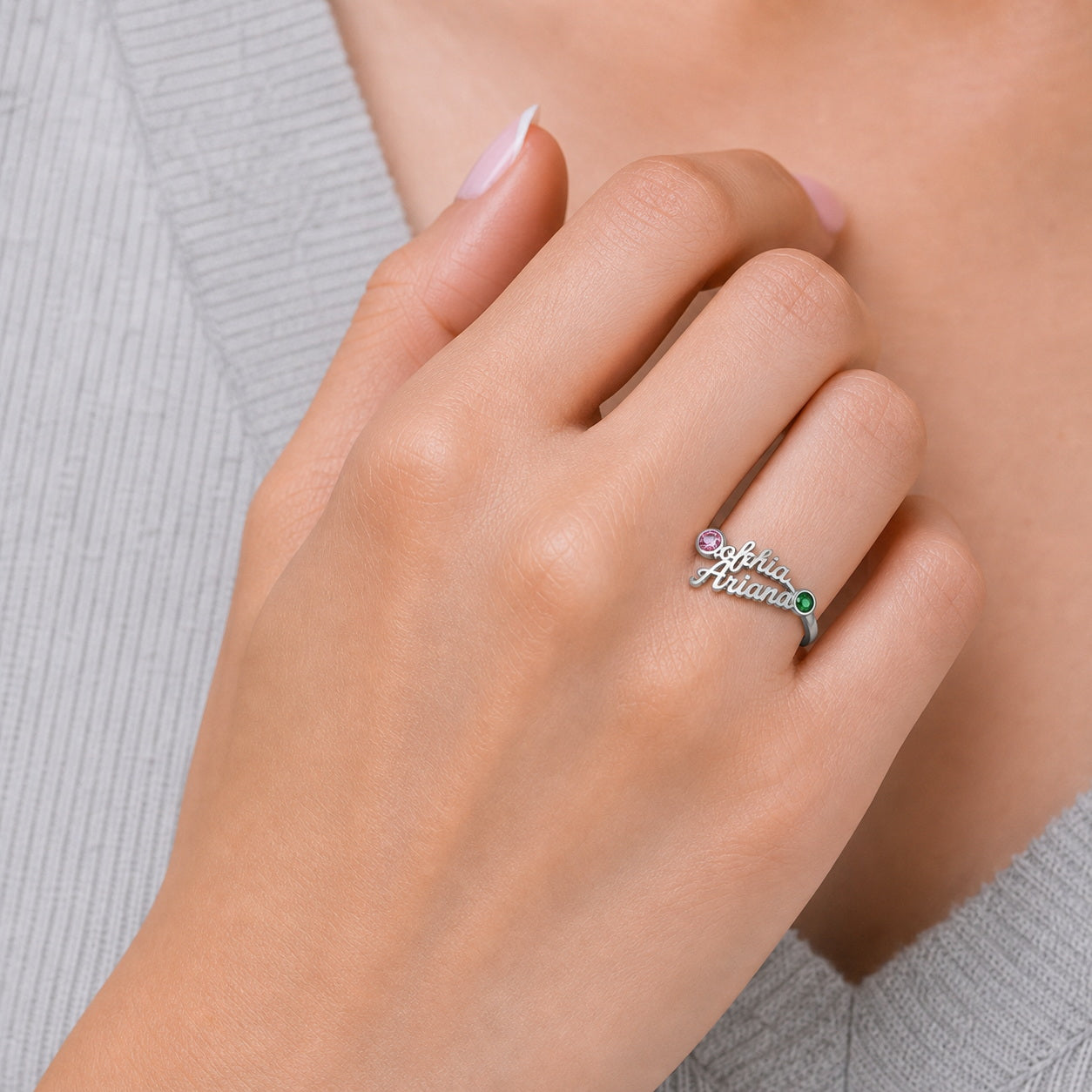 Custom name birthstone ring on hand