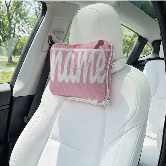 Personalized pink puppy travel pillow in car seat