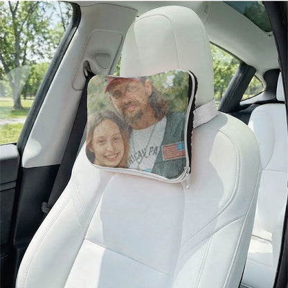 Custom memorial photo pillow used as a car headrest.