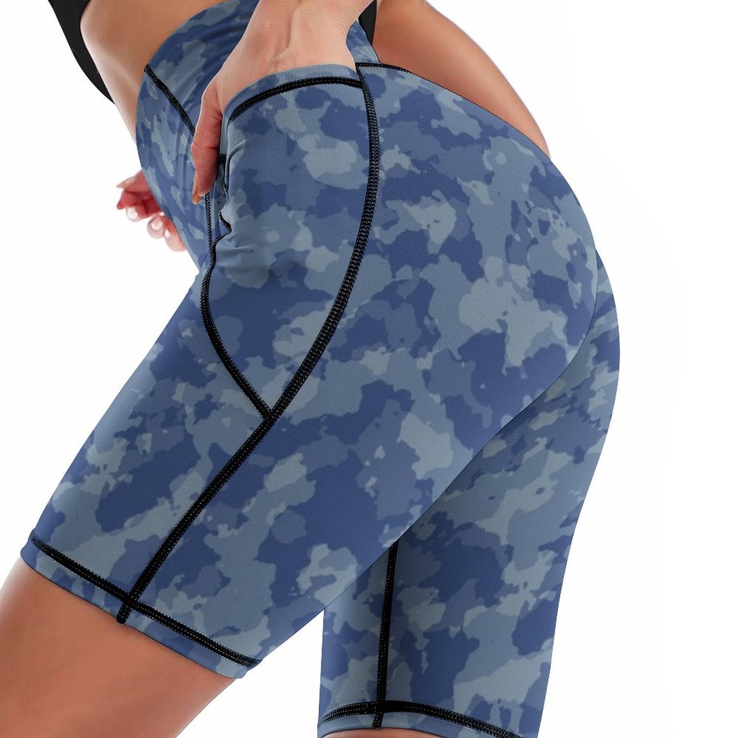 Women's gym legging shorts with pockets, blue custom camo print close-up.