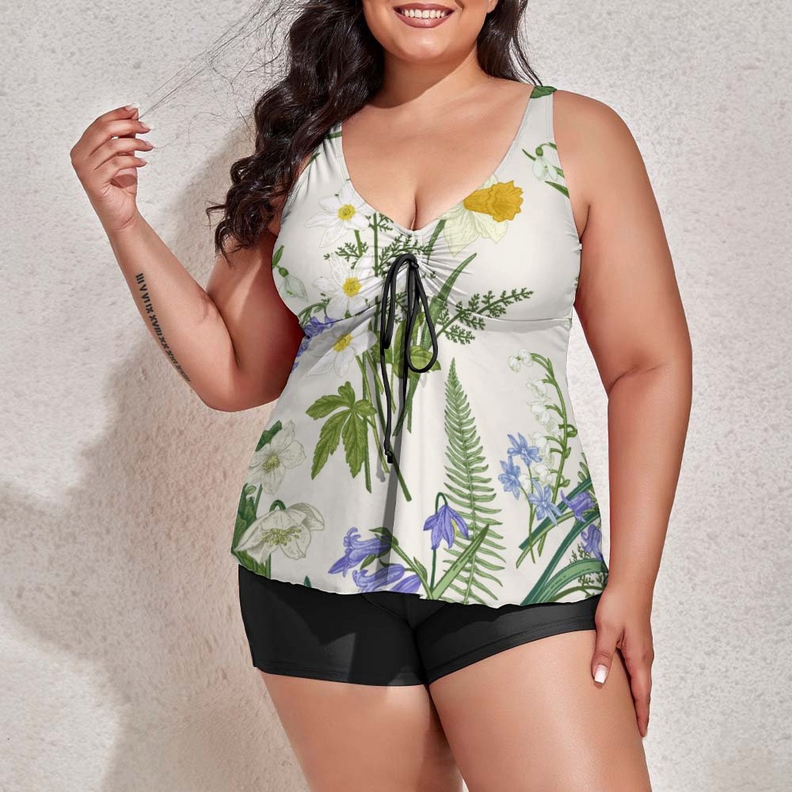 Custom print plus size tankini top with black swim shorts, full frontal view.