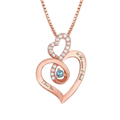 Rose gold double heart necklace with a blue birthstone.