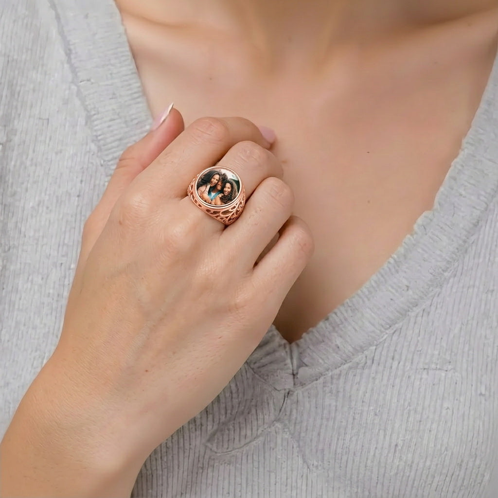 Custom round photo filigree signet ring worn on hand
