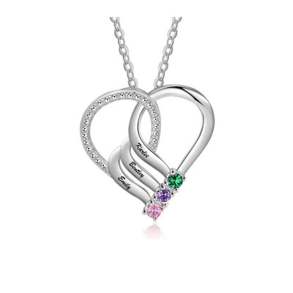 Silver heart pendant with 3 names and colorful stones.